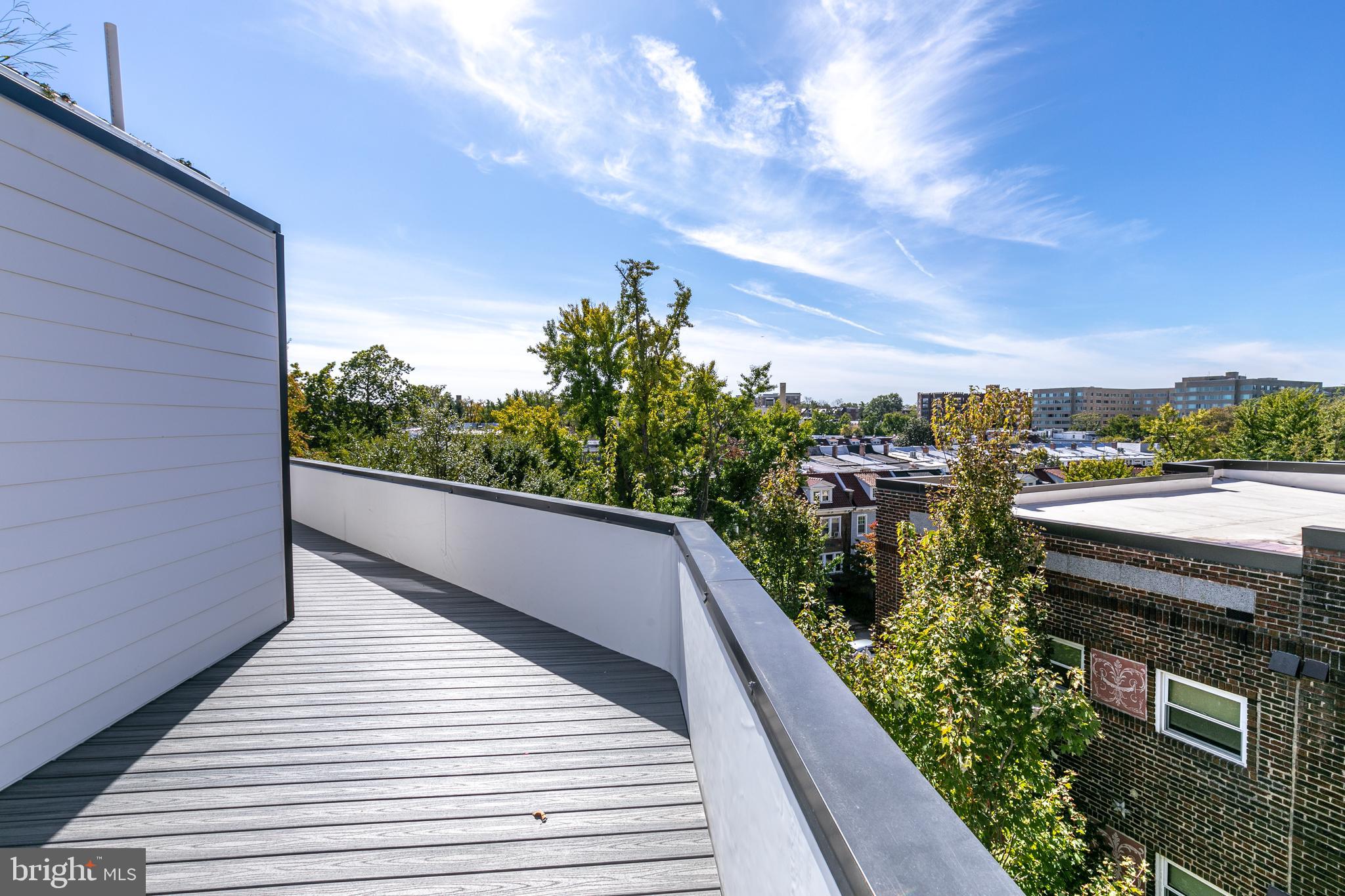 a view of balcony with furniture