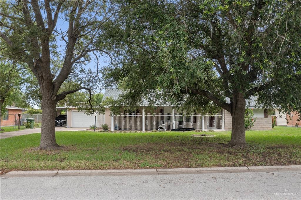 a house with trees in the background