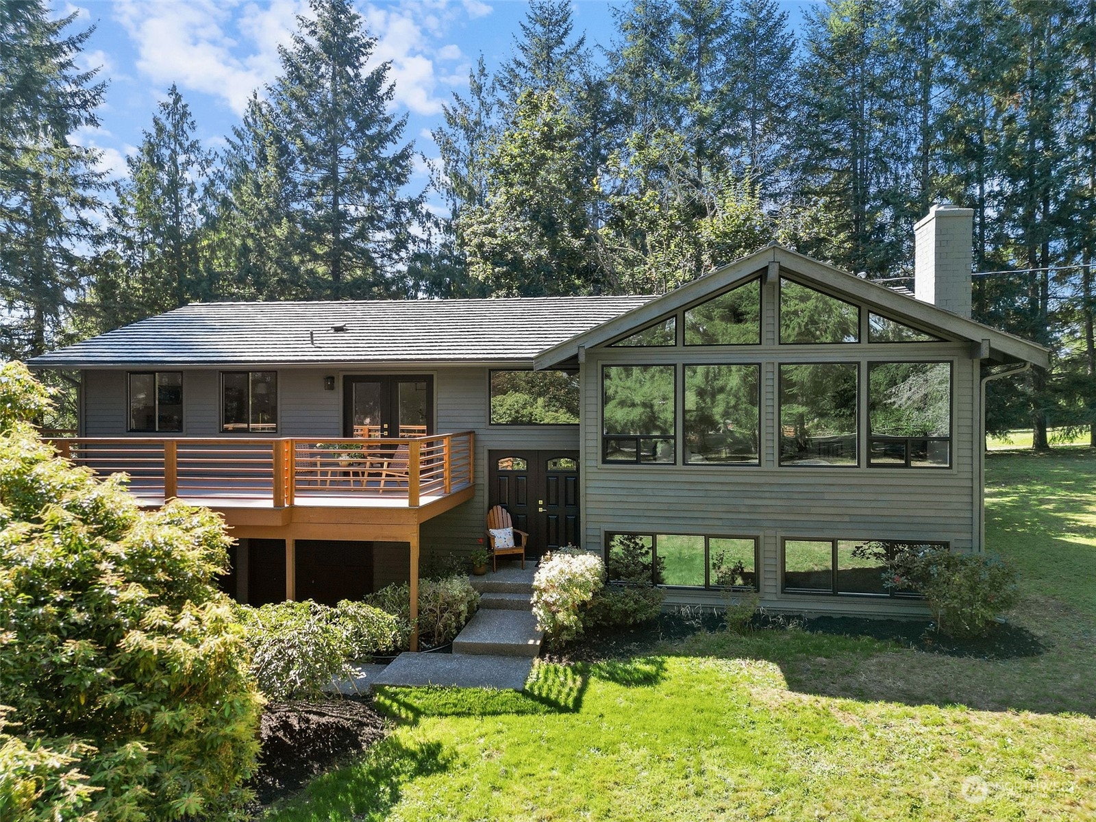 a front view of a house with garden