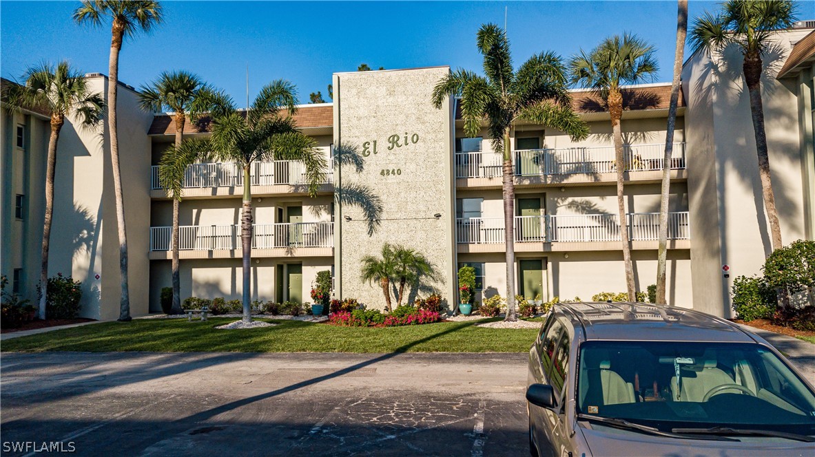 a front view of a building with street view