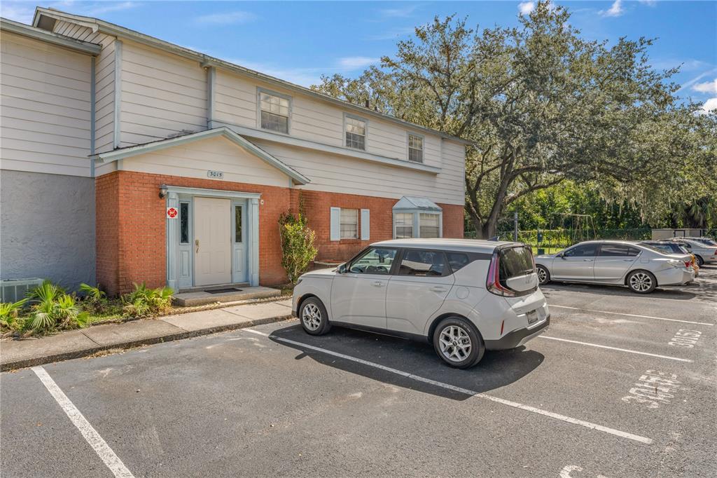 a car parked in front of a house