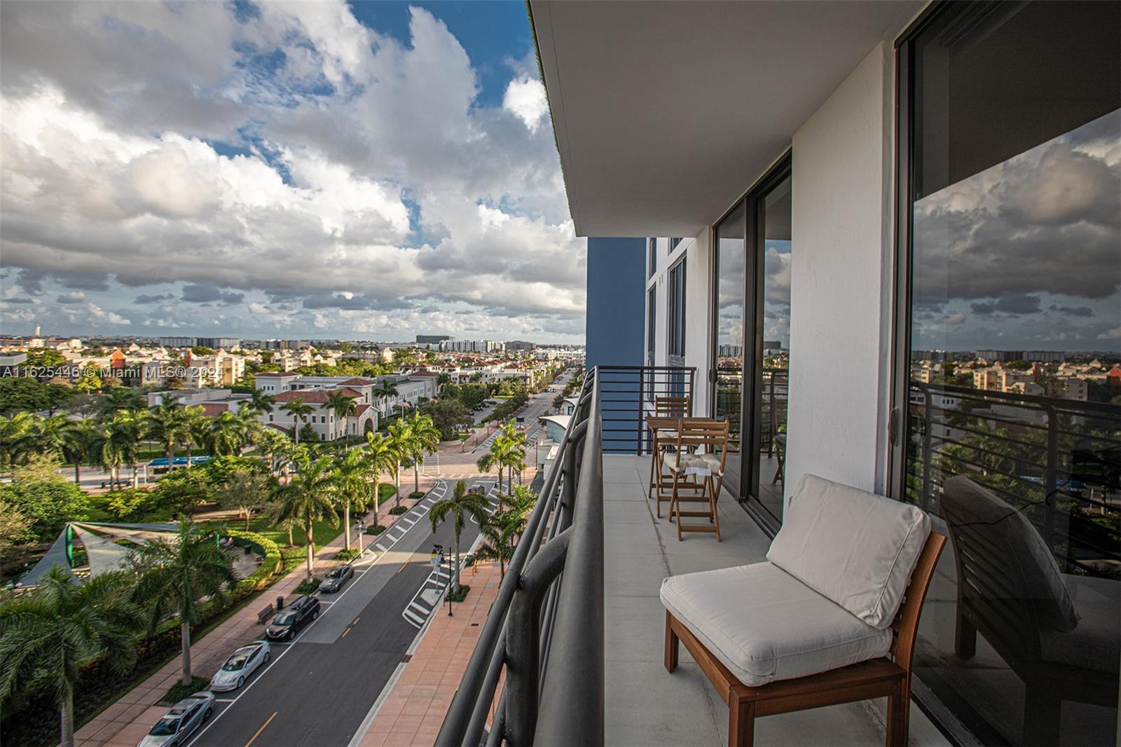 a view of a balcony with chairs