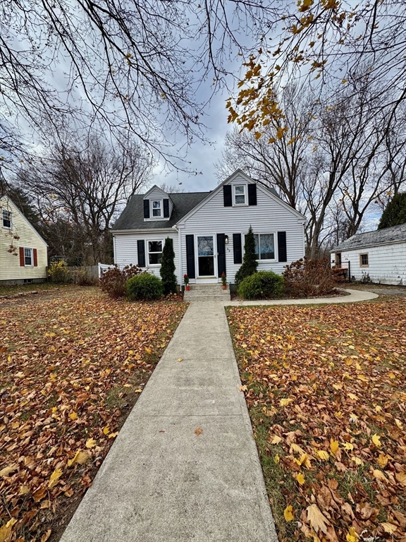 a front view of house with yard