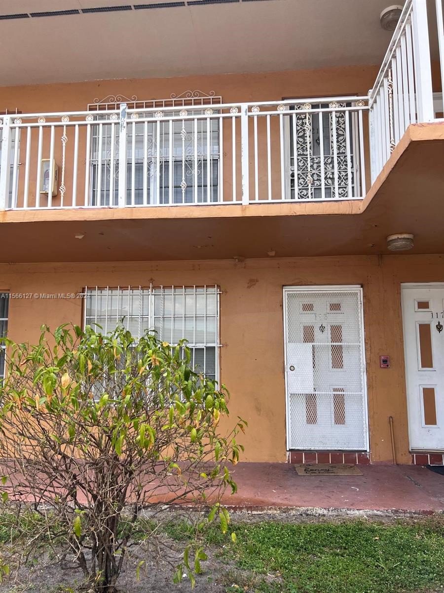 a view of balcony with a garden