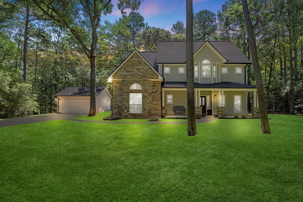 front view of a house with a yard