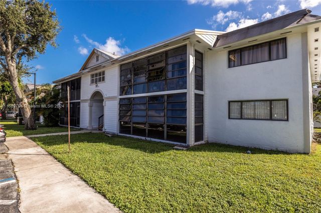 $295,000 | 18785 Northwest 62nd Avenue, Unit 107 | Country Club of Miami