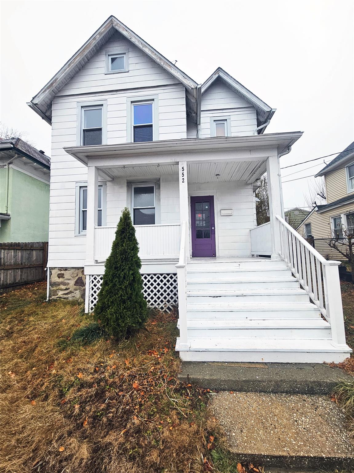 View of front of property with a porch