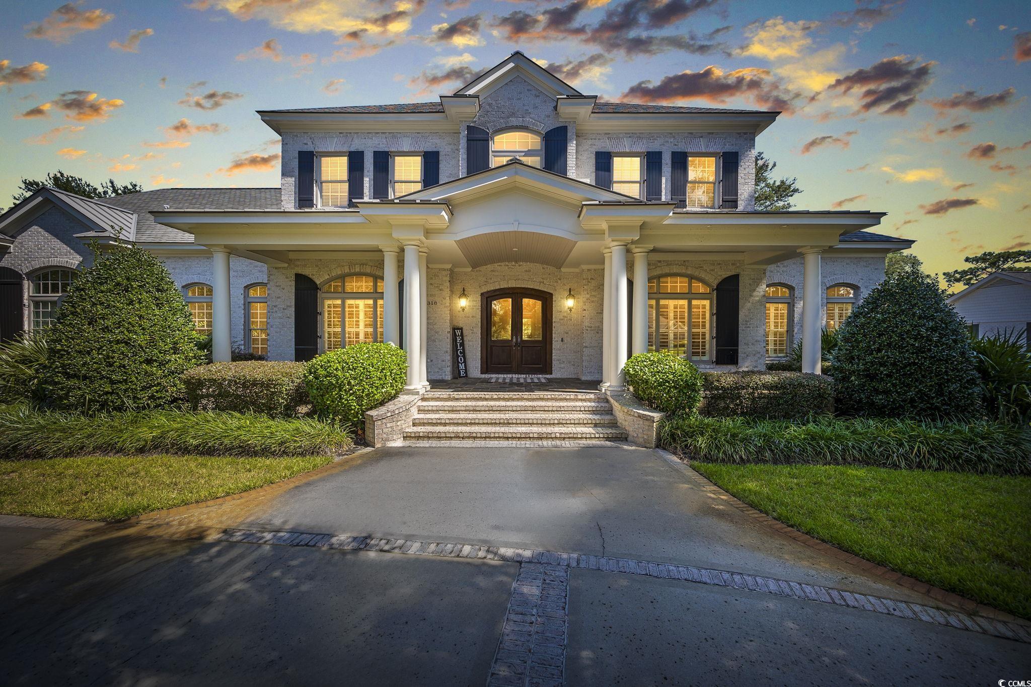 View of front of property with a porch