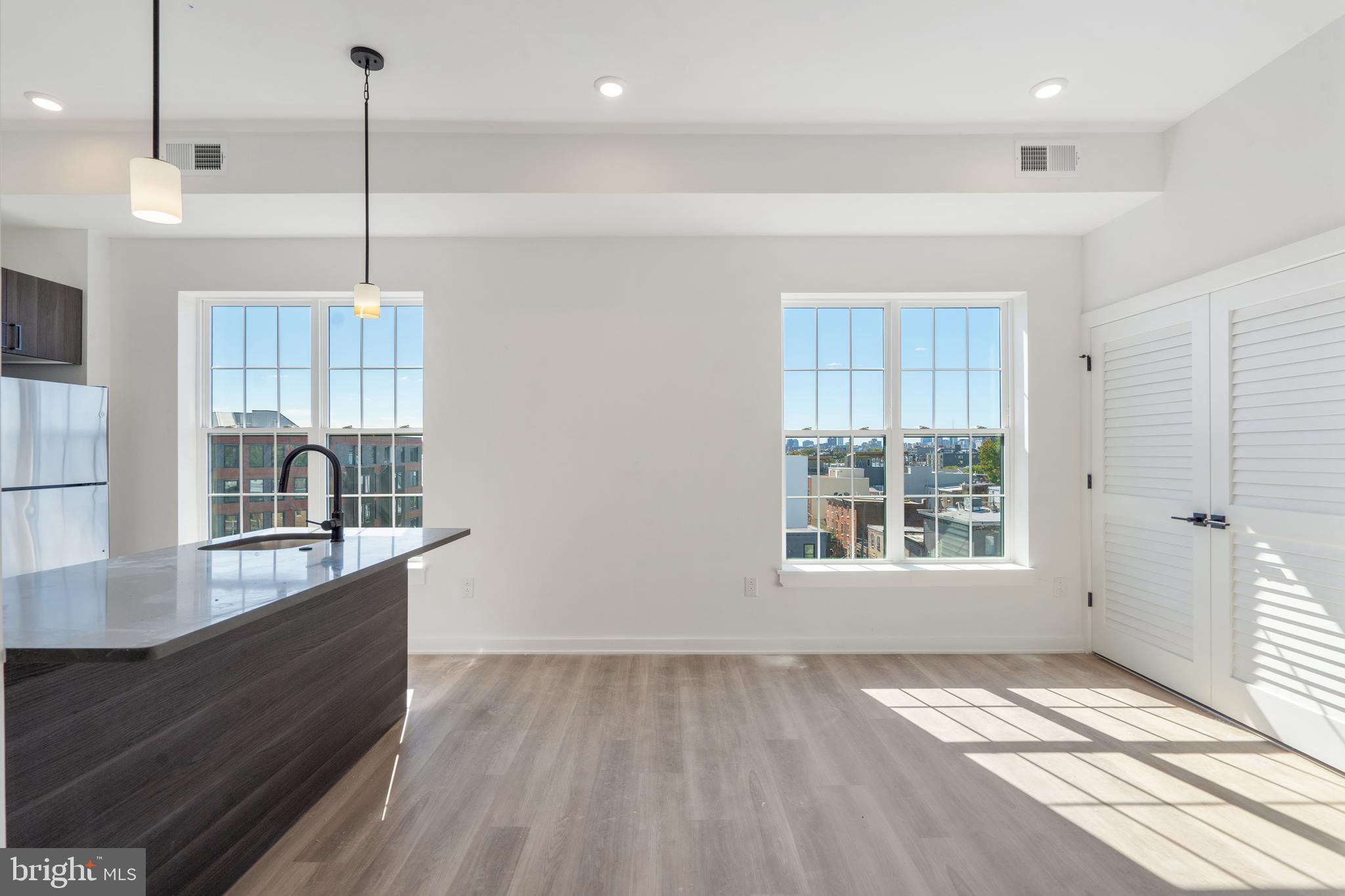 a view of a kitchen and window