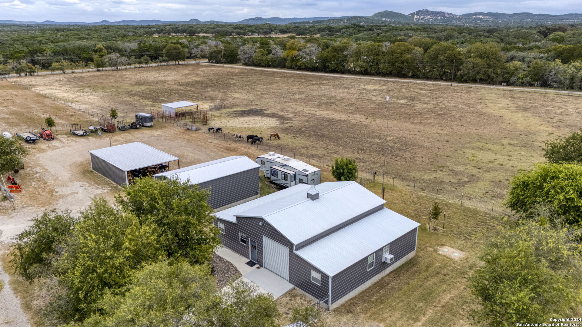 an aerial view of residential house with outdoor space