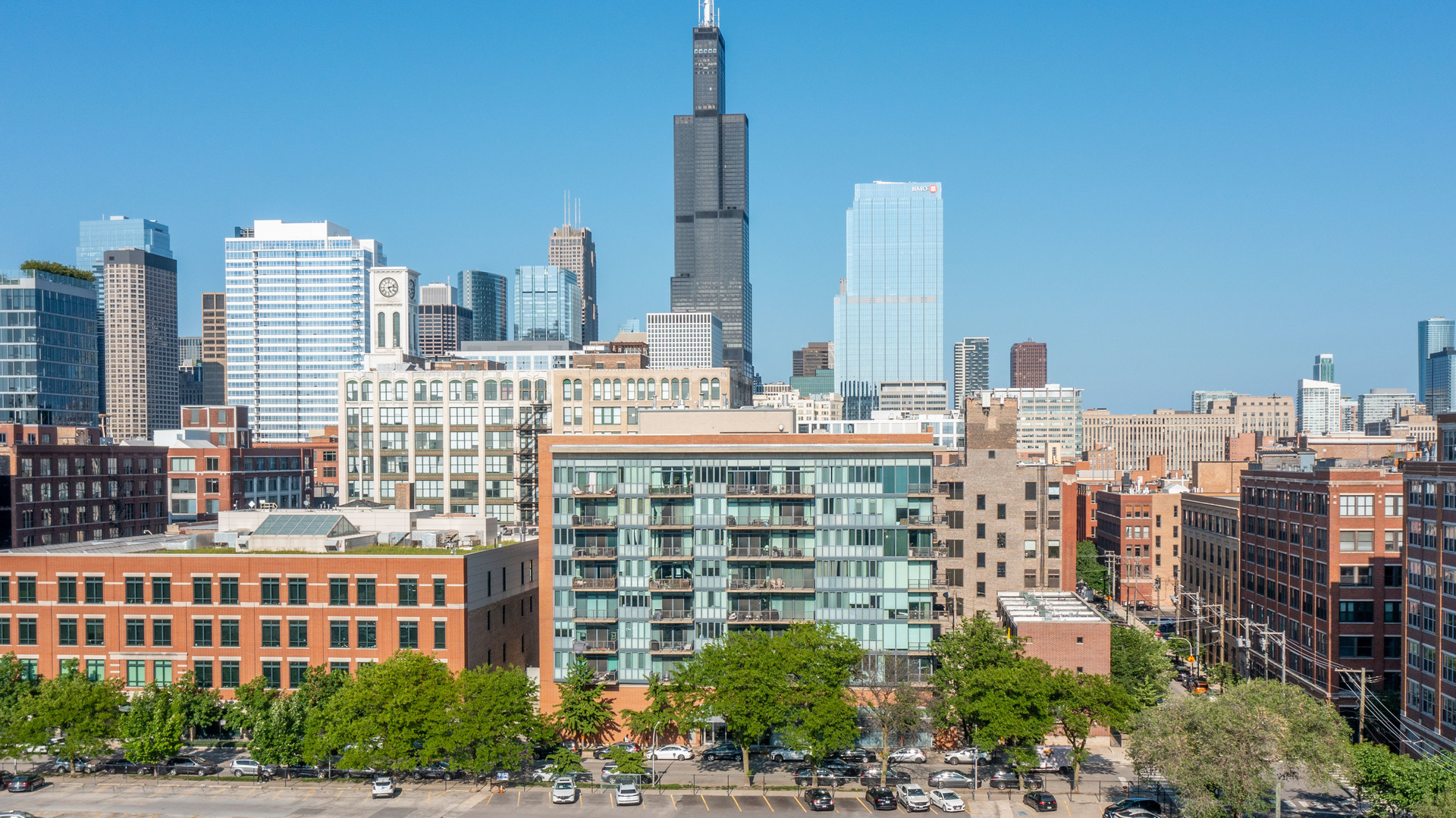 a view of a city with tall buildings