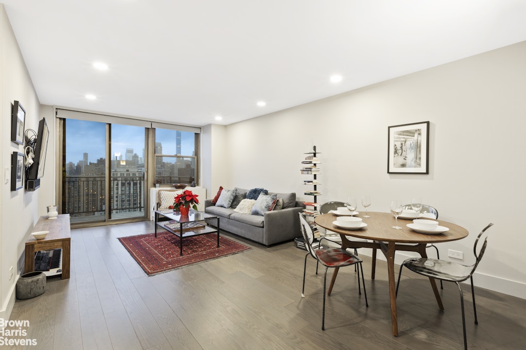 a living room with furniture and a table