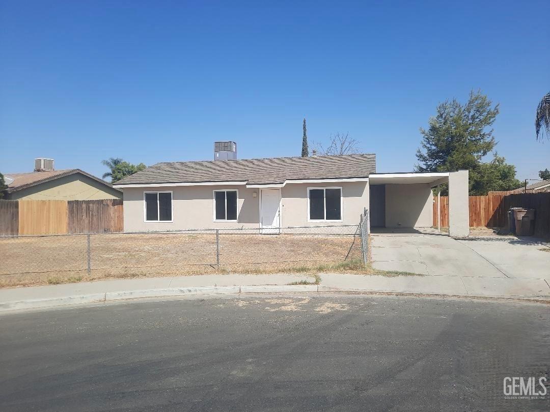 a front view of a house with a garage