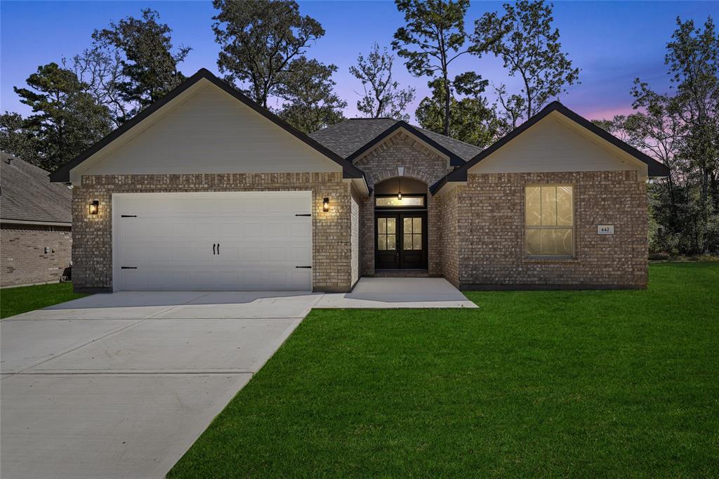 a front view of house with yard