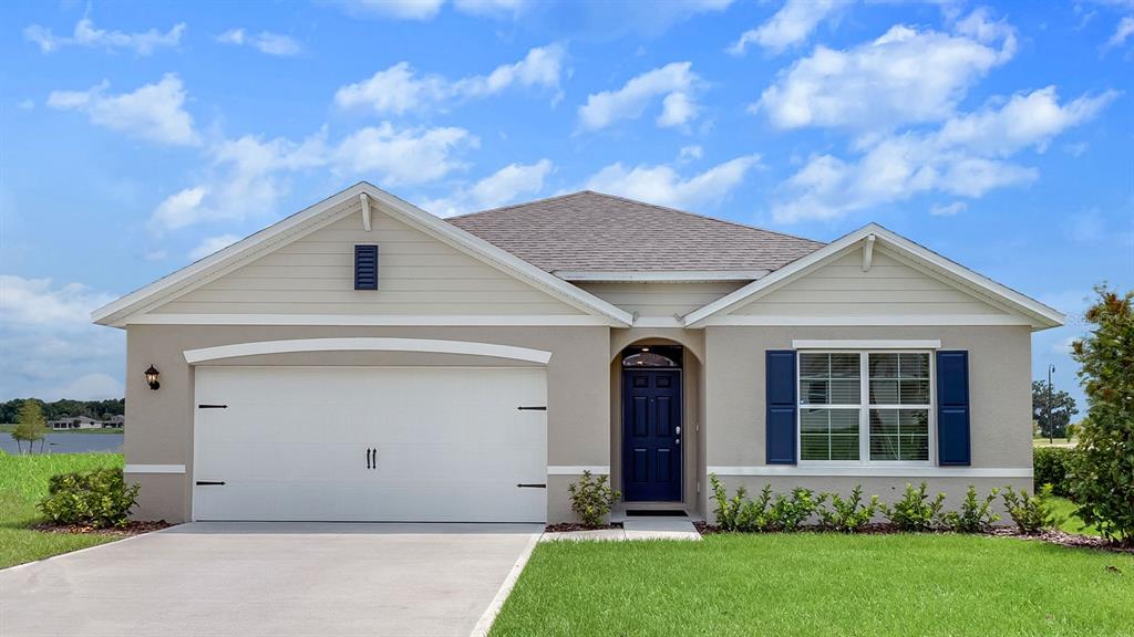 a front view of house with yard