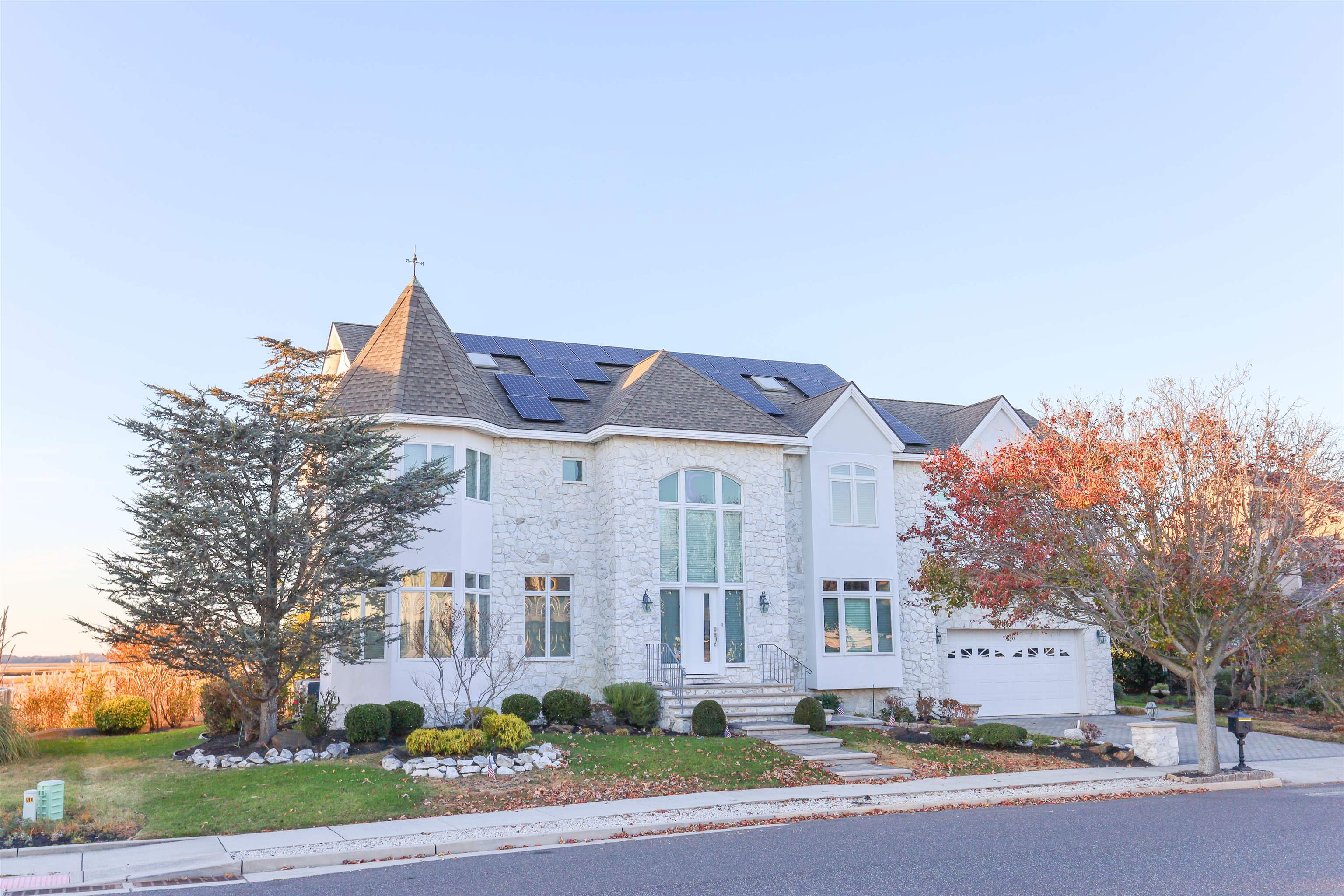 a view of a building with a yard