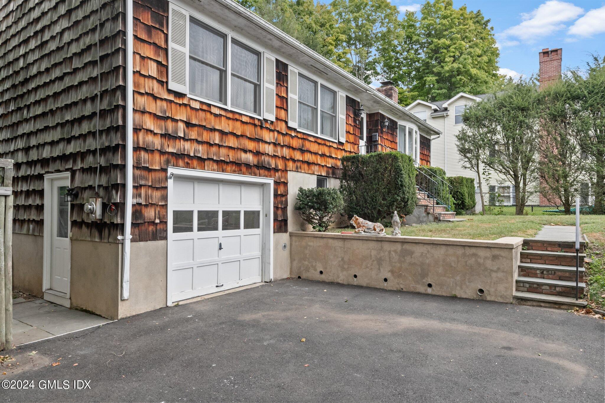 a view of house with outdoor space