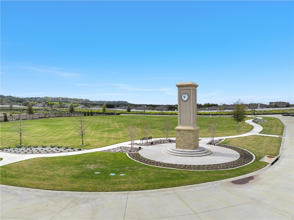 a view of a lake with a big yard