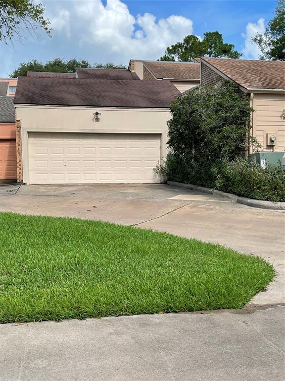 a view of backyard with green space