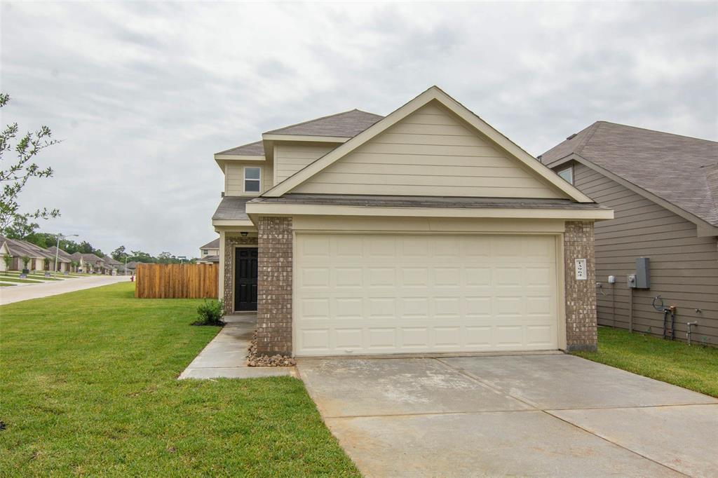 a front view of house with yard