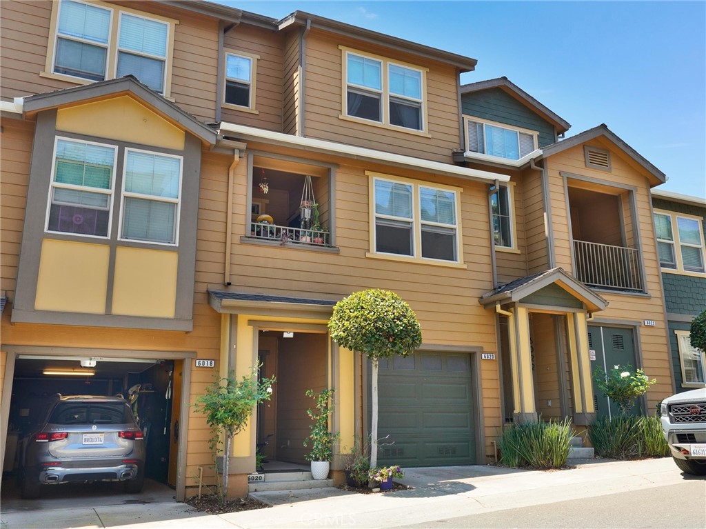 a front view of a house having yard