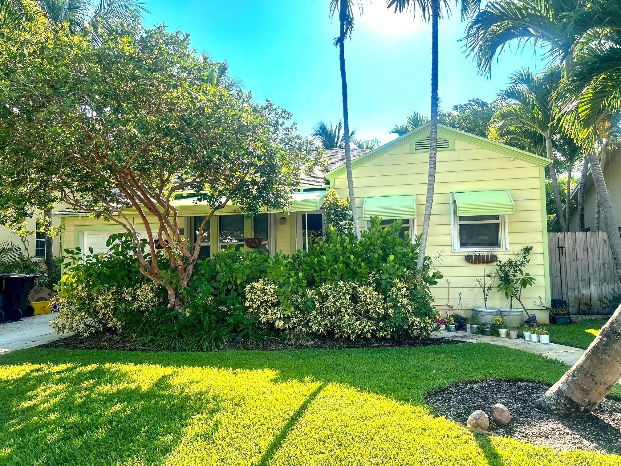 a house view with a garden space