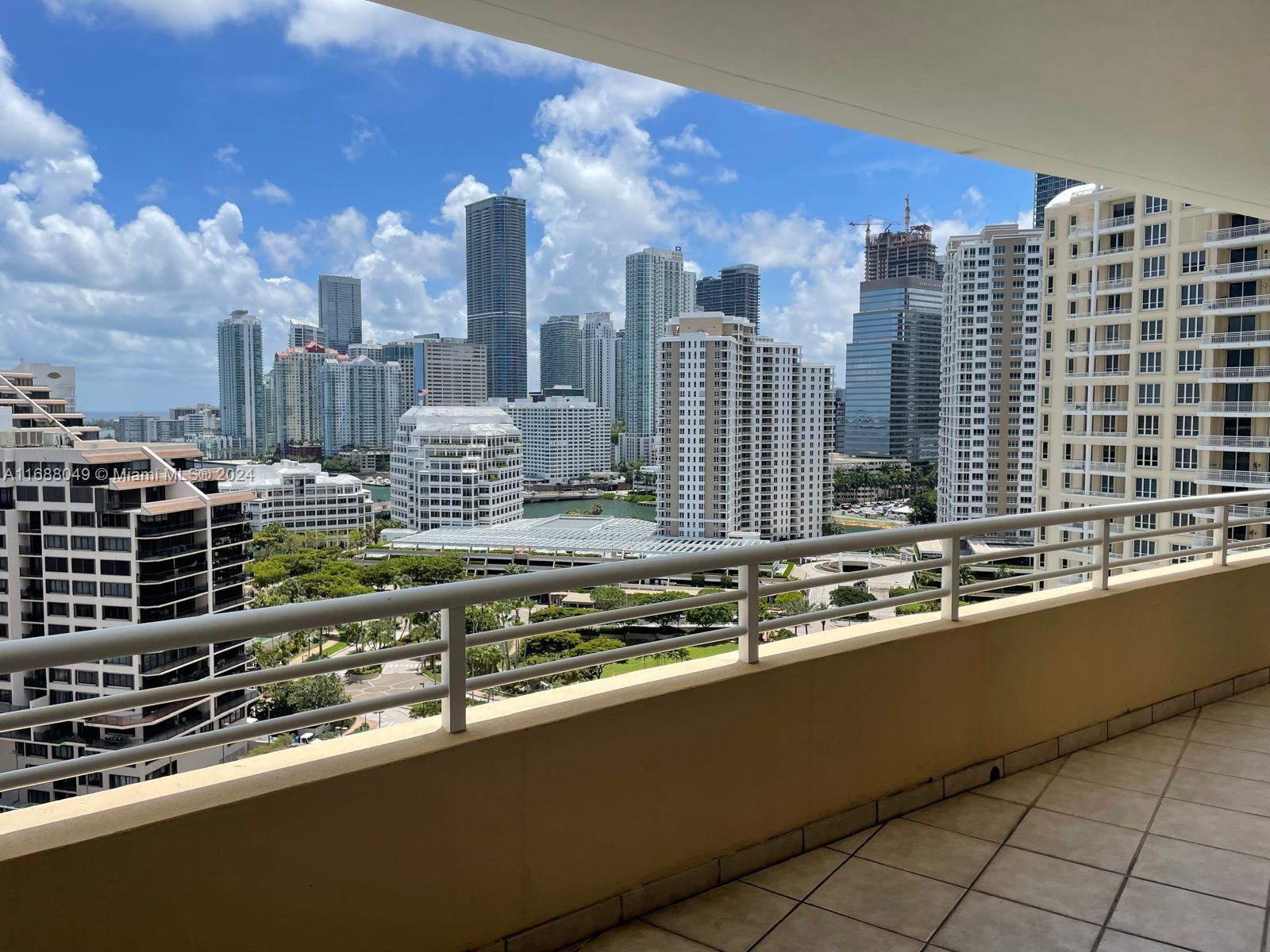 a view of city with tall buildings