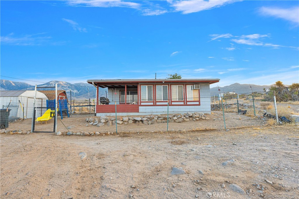 a view of an house with backyard space