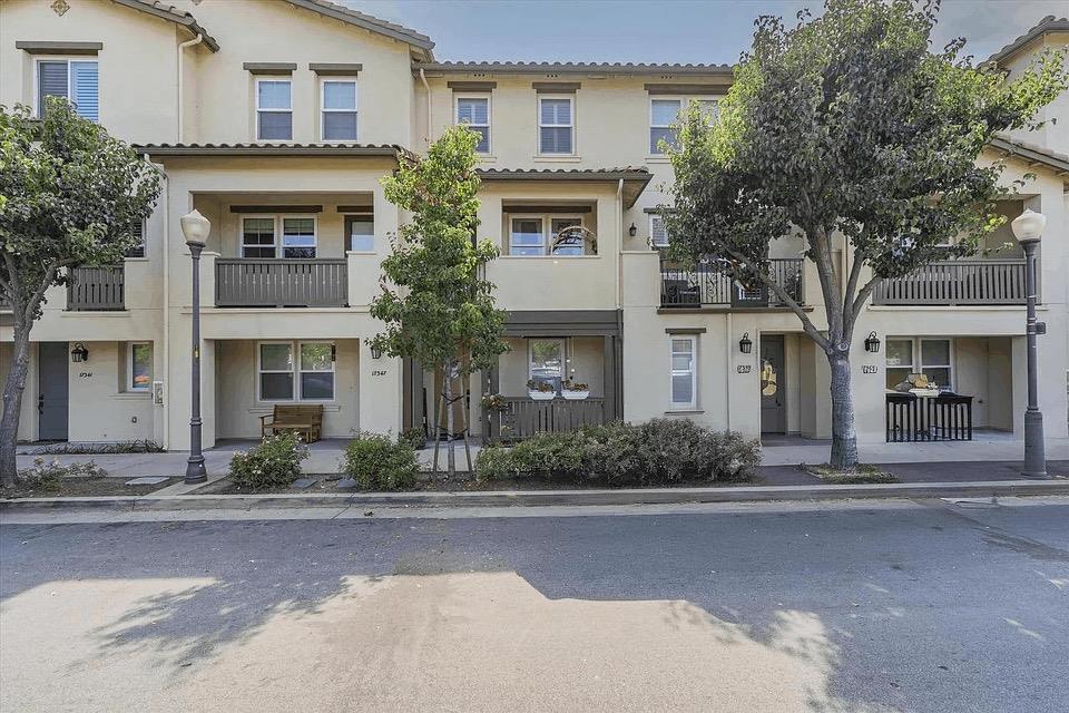 a front view of a house with yard