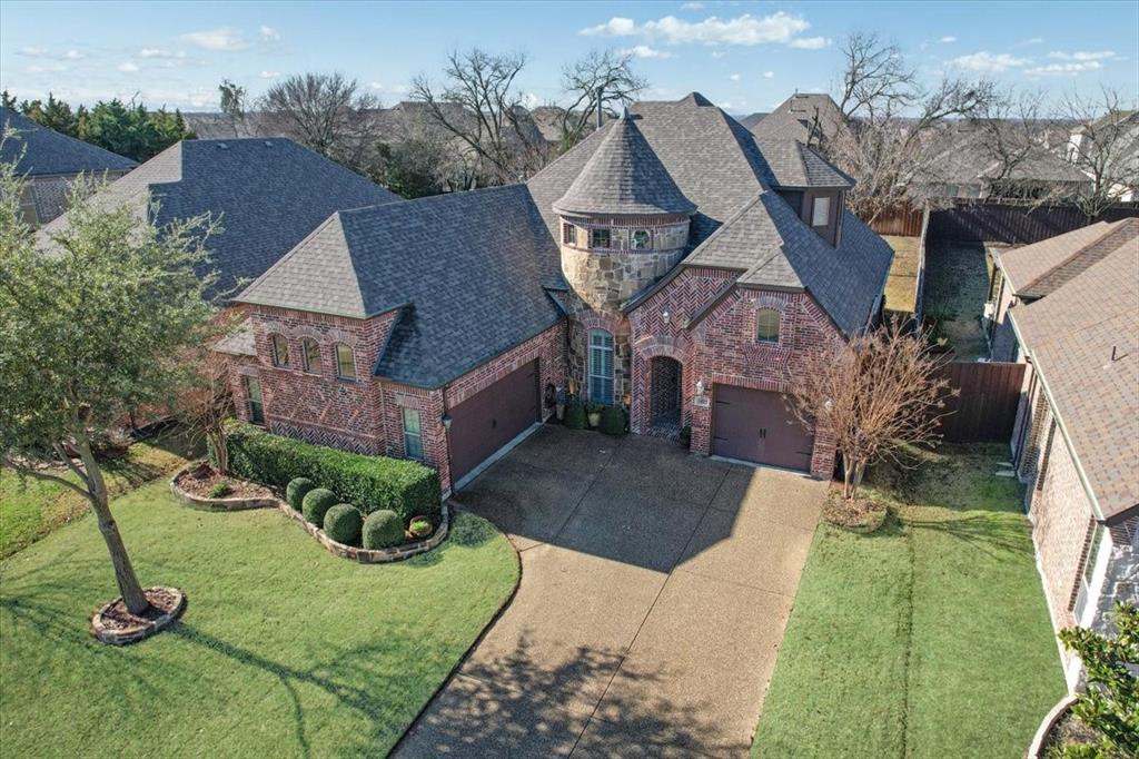 an aerial view of a house with garden