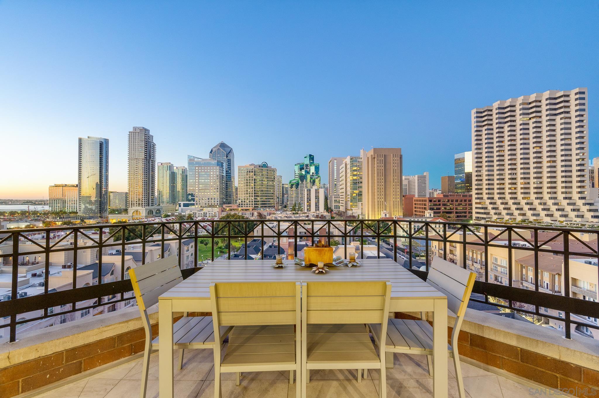 a view of a balcony with city view