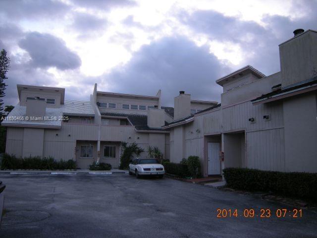 a car parked in front of a building