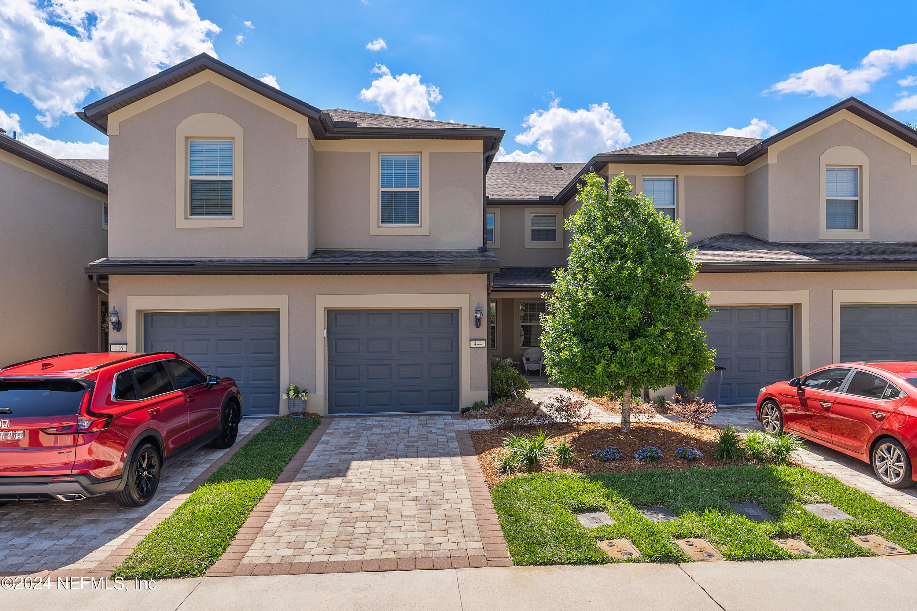 a house view with a garden space