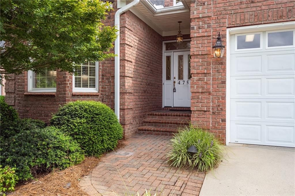 Covered porch with bull-nose brick steps