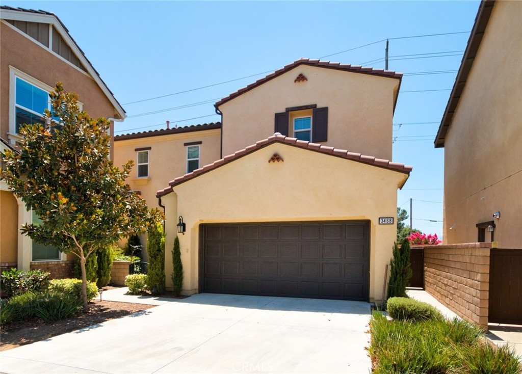 a front view of a house with a garage