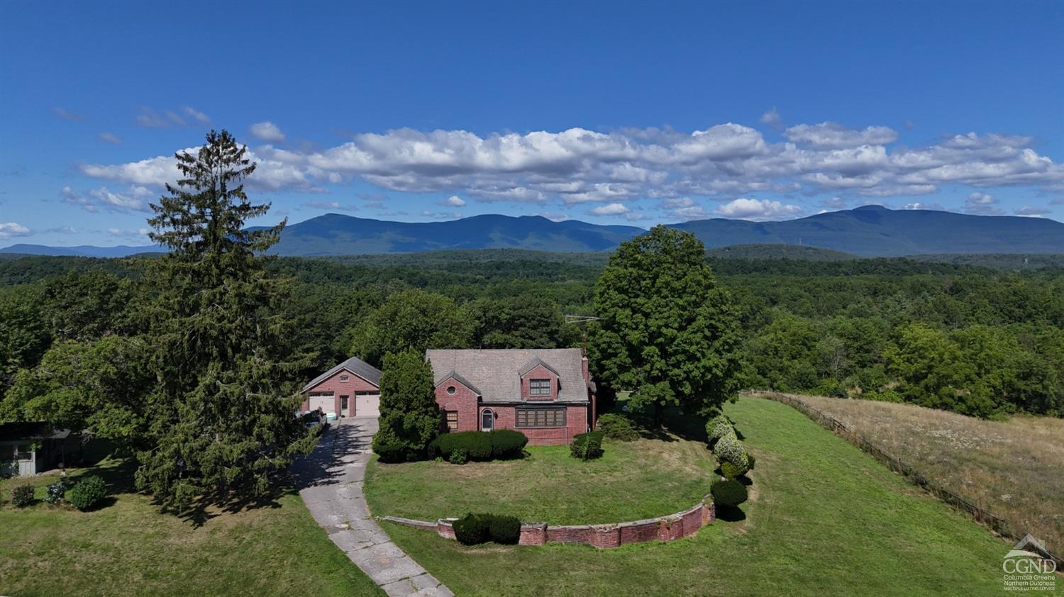 a view of a house with a big yard