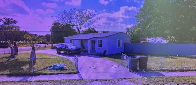 a view of a backyard with a house