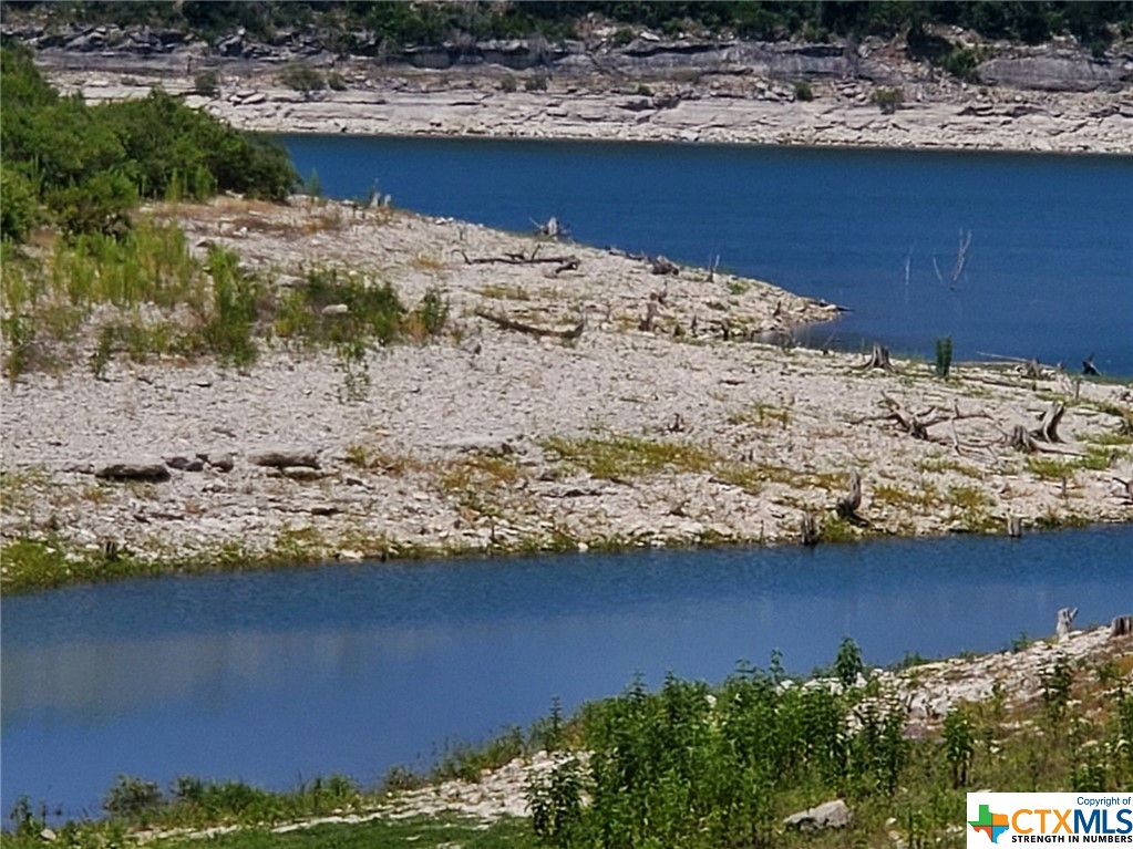 a view of a lake with a mountain