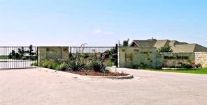 a view of a street with a building in the background