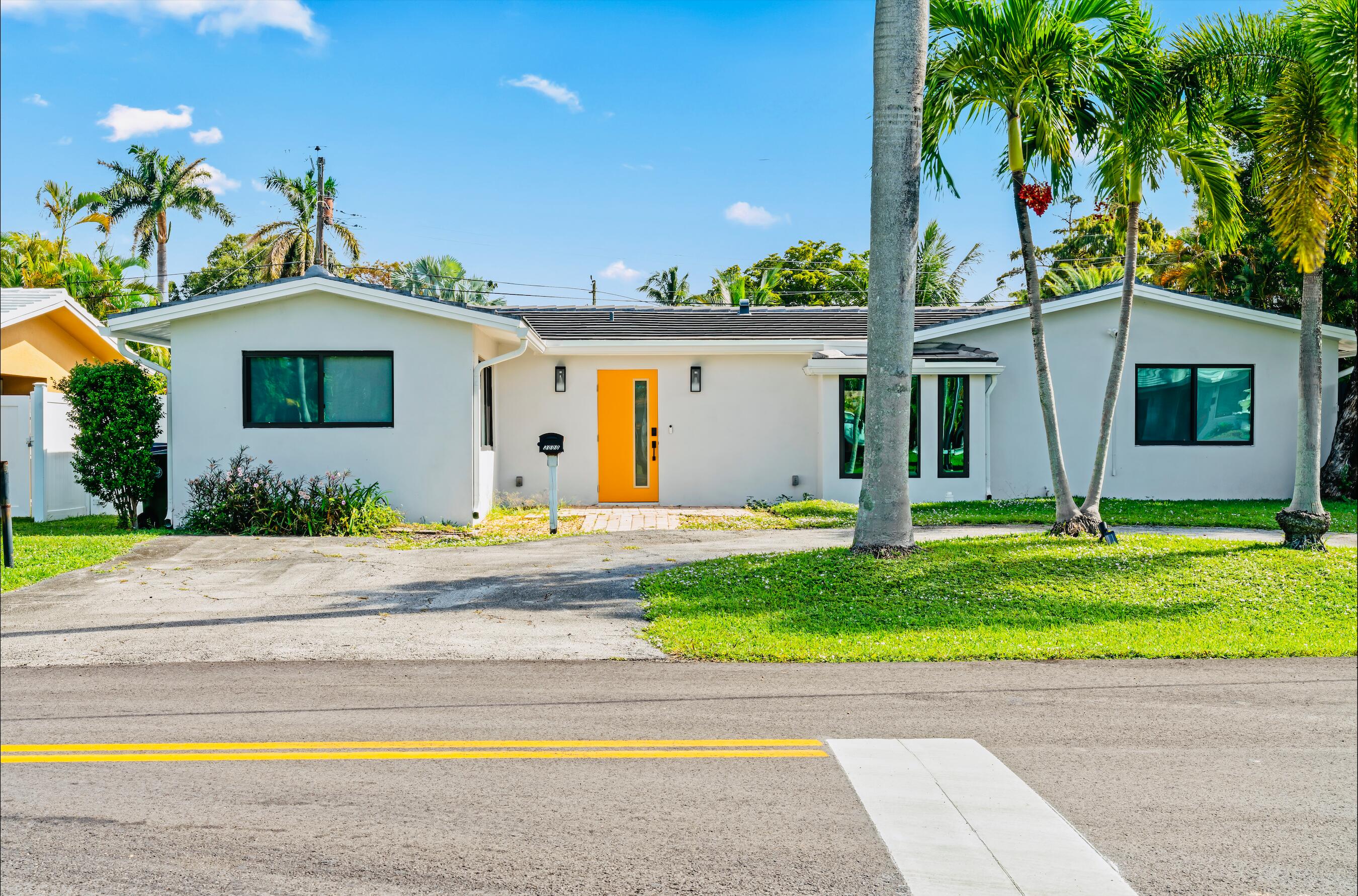 a front view of house with yard