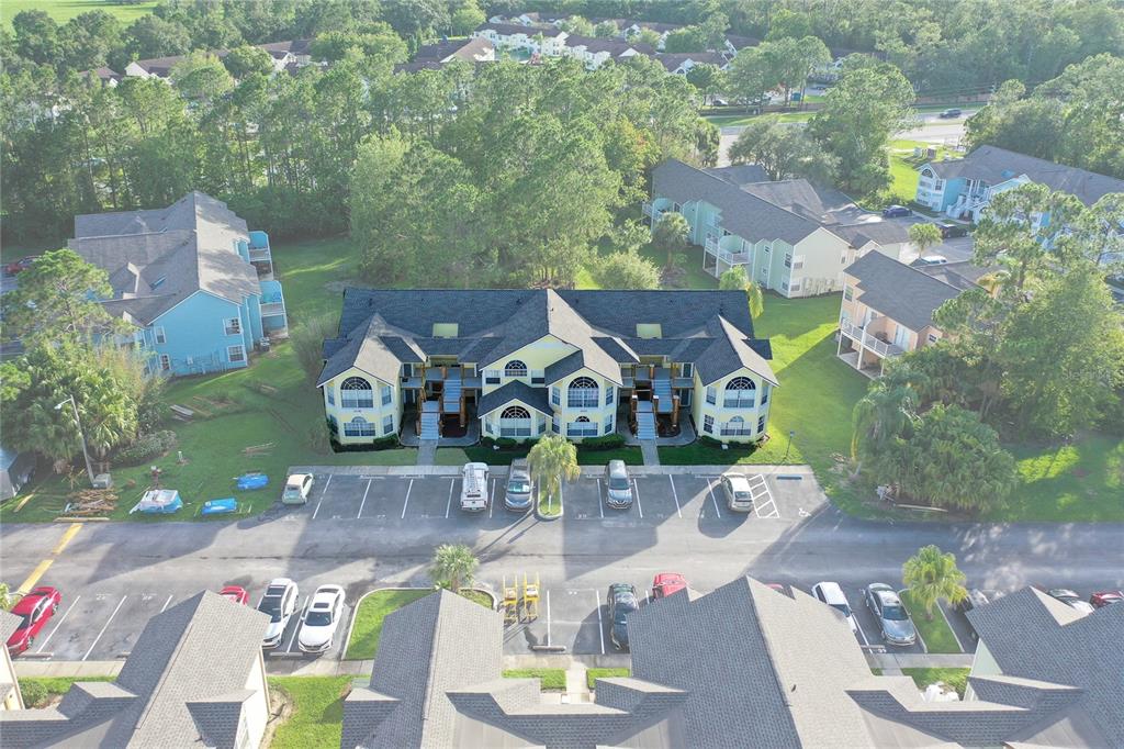 an aerial view of a house with outdoor space