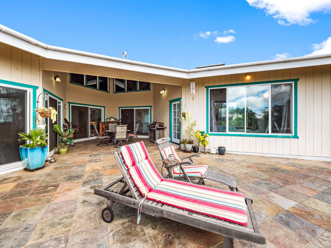 a house view with a outdoor space