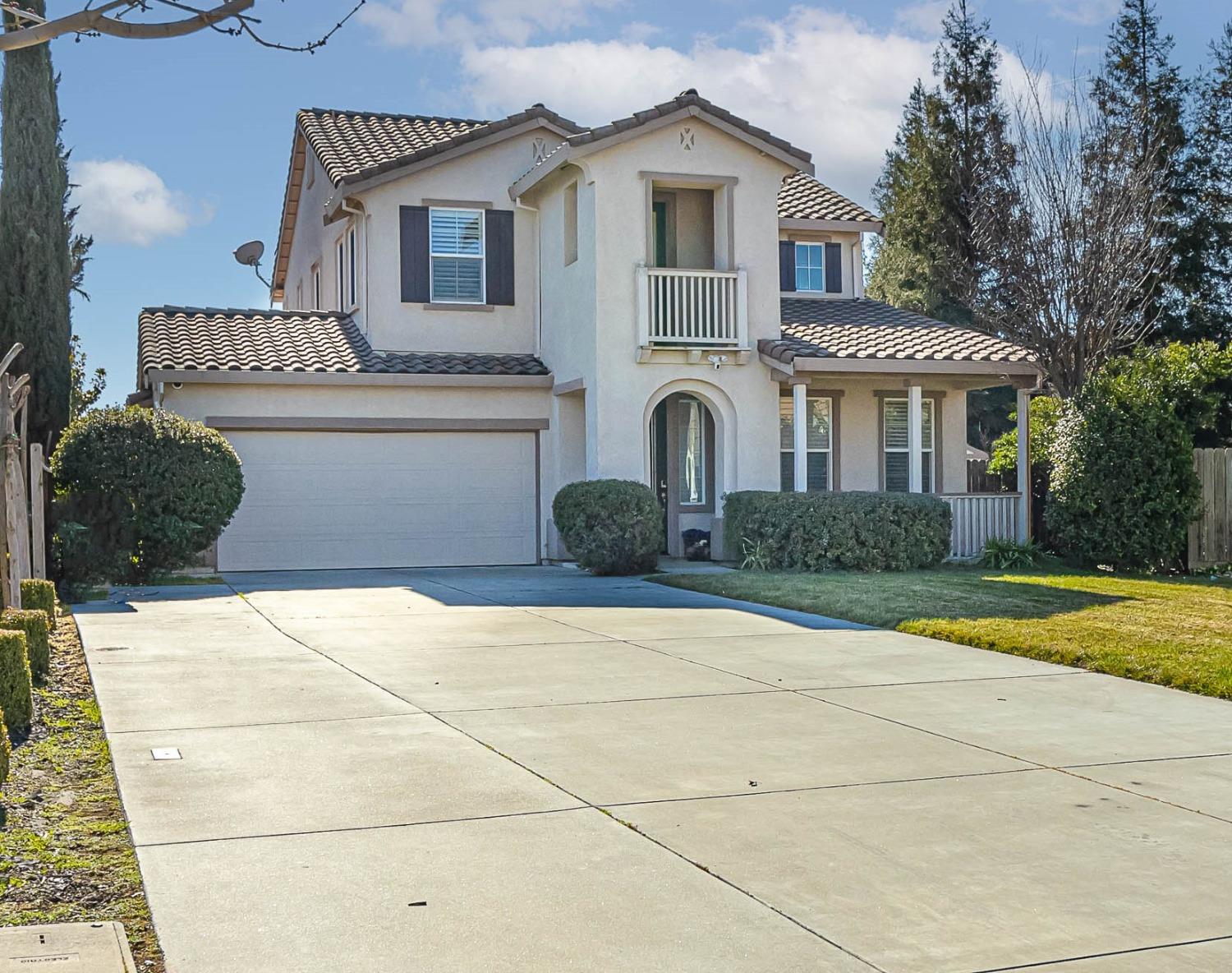 Front view. Driveway is 62' to sidewalk. Parking for RV and several cars.