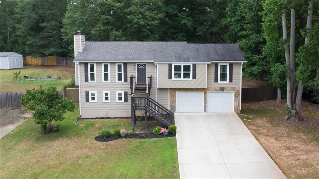 front view of a house with a yard