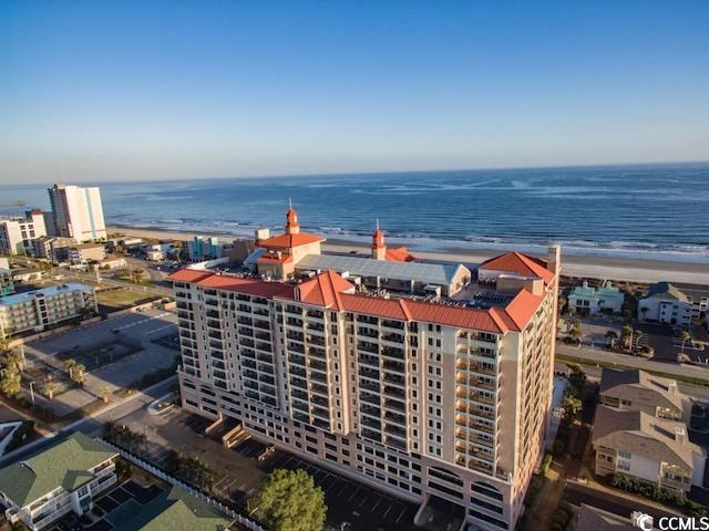 Aerial view with a water view and a view of the be