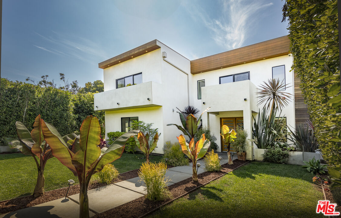 a view of a house with a patio