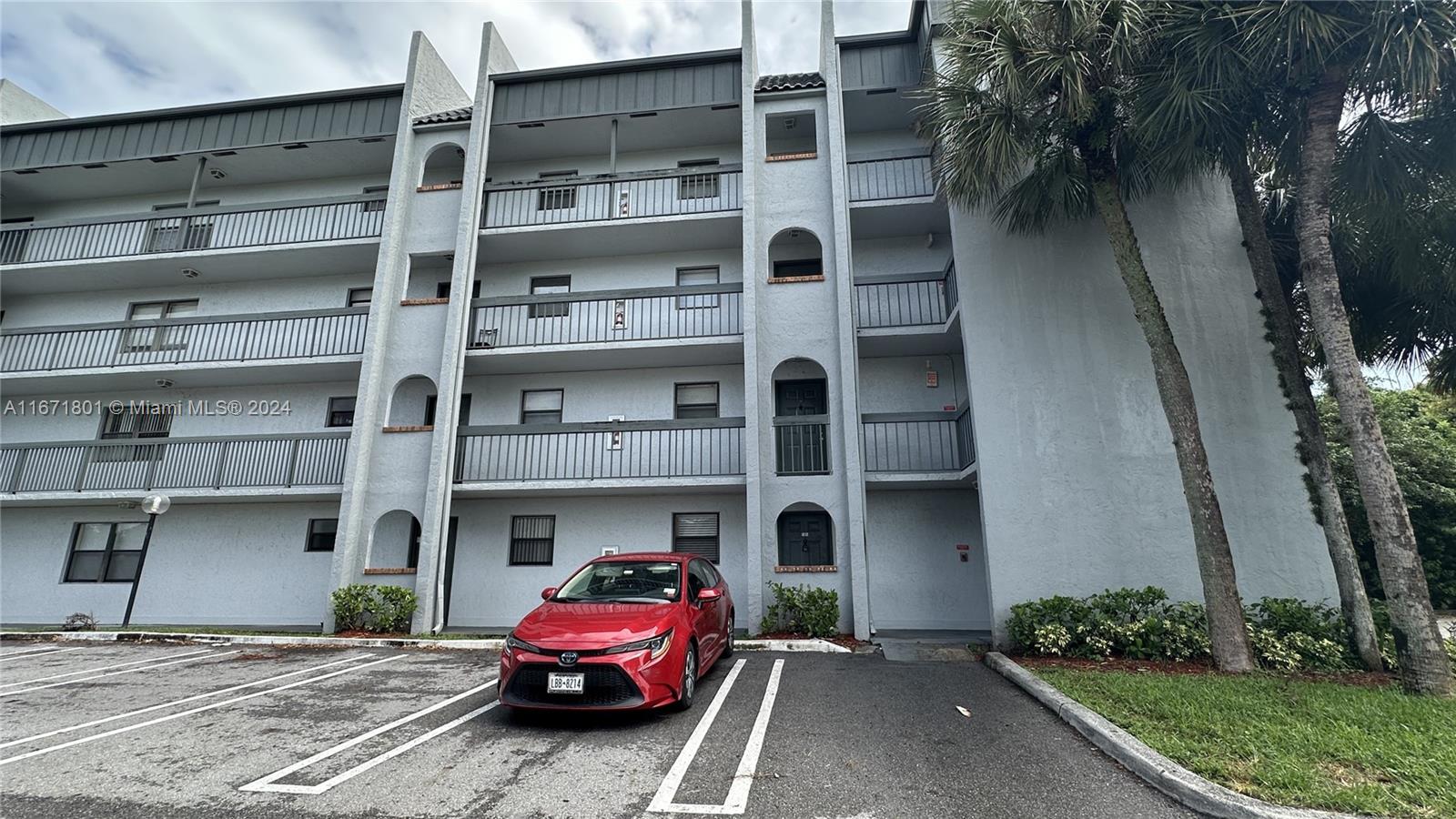 a house with parking in front of it