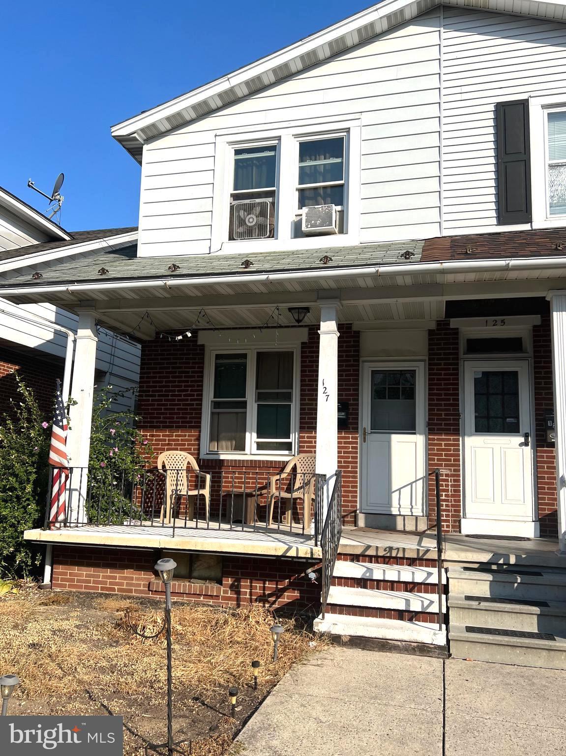 a view of a house with a patio