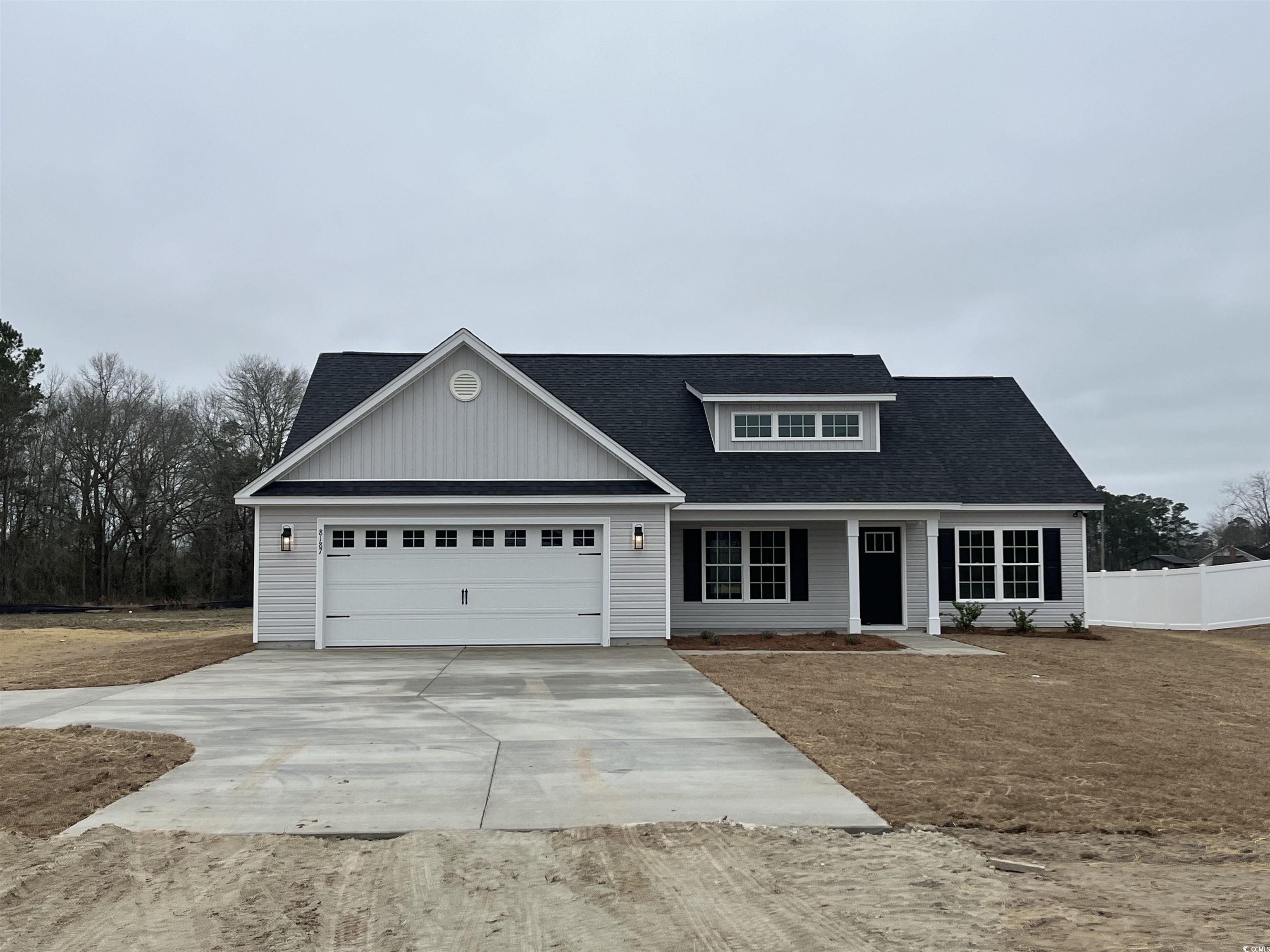 View of front of home with a garage