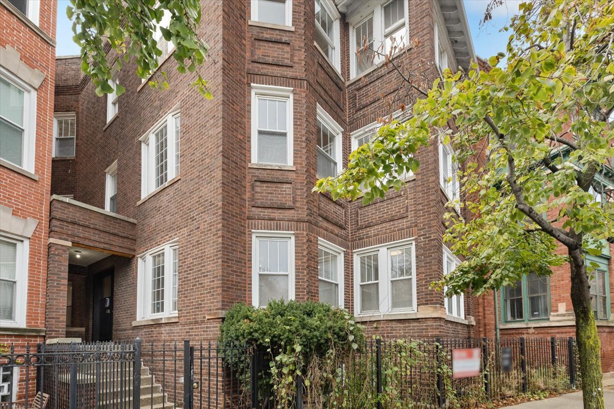 a front view of a multi story residential apartment building